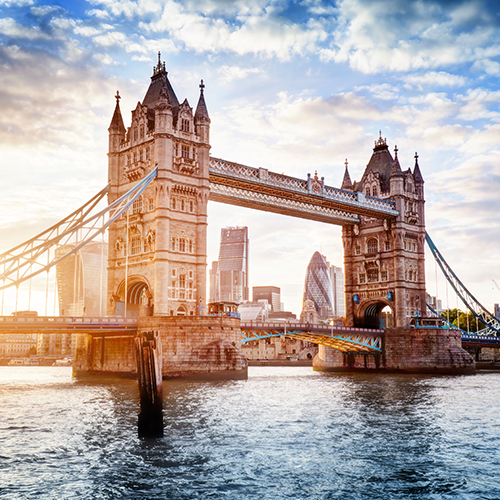 Tower Bridge in London, the UK. Sunset with beautiful clouds. Drawbridge opening. One of English symbols